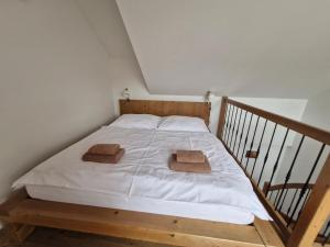 Postel nebo postele na pokoji v ubytování Restaurace - Apartmány Bobule