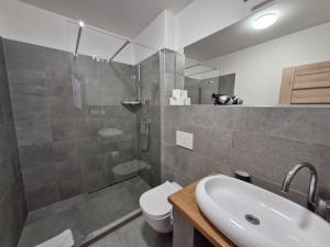 Koupelna v ubytování Restaurace - Apartmány Bobule