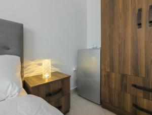 Postel nebo postele na pokoji v ubytování Center Luxury Rooms