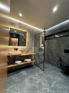 Koupelna v ubytování Hotel Joni