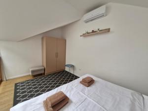 Postel nebo postele na pokoji v ubytování Restaurace - Apartmány Bobule