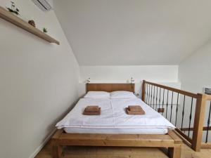 Postel nebo postele na pokoji v ubytování Restaurace - Apartmány Bobule