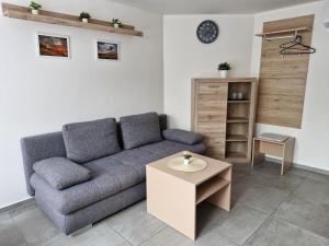 Posezení v ubytování Restaurace - Apartmány Bobule