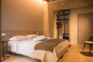 Postel nebo postele na pokoji v ubytování Residenza Castei
