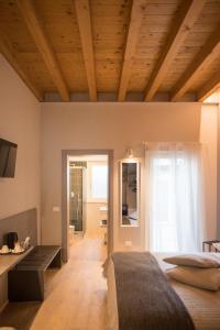 Postel nebo postele na pokoji v ubytování Residenza Castei