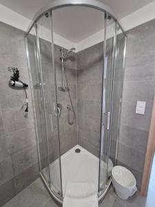 Koupelna v ubytování Restaurace - Apartmány Bobule