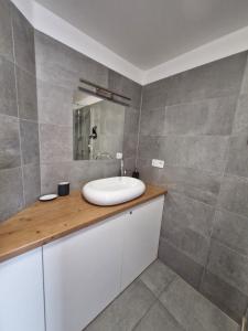 Koupelna v ubytování Restaurace - Apartmány Bobule