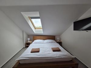 Postel nebo postele na pokoji v ubytování Restaurace - Apartmány Bobule
