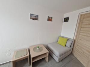Posezení v ubytování Restaurace - Apartmány Bobule