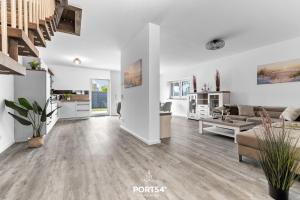 Kuchyň nebo kuchyňský kout v ubytování Ferienhaus Sonnenstein Fehmarn