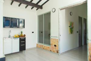Kuchyň nebo kuchyňský kout v ubytování Casa del Lago