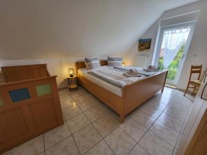 Katil atau katil-katil dalam bilik di Ferienhaus Wischer