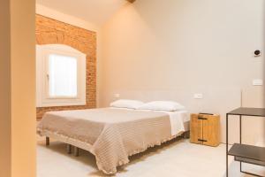 Postel nebo postele na pokoji v ubytování Residenza Castei