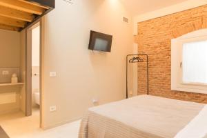 Postel nebo postele na pokoji v ubytování Residenza Castei