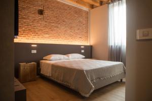 Postel nebo postele na pokoji v ubytování Residenza Castei