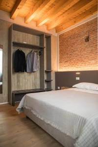 Postel nebo postele na pokoji v ubytování Residenza Castei