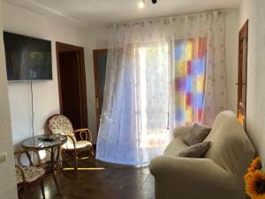 TV a/nebo společenská místnost v ubytování Casa de la playa