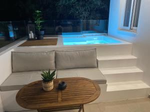 The swimming pool at or close to Theros Luxury Apartment