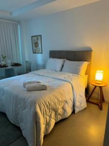 Ένα ή περισσότερα κρεβάτια σε δωμάτιο στο Flat em Boa Viagem no Rooftop 470