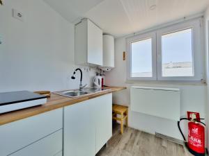 Kuchyň nebo kuchyňský kout v ubytování STUDIO-4-YOU