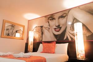 Voodi või voodid majutusasutuse Hotel Plaza Garibaldi toas