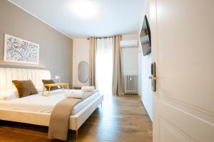 Camera con letto e TV di Arre Mida a Bari