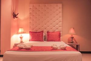 Voodi või voodid majutusasutuse Hotel Plaza Garibaldi toas