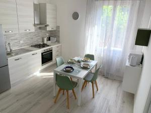 Η κουζίνα ή μικρή κουζίνα στο Sweet Home Mariana