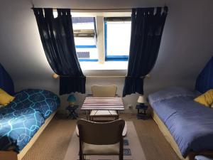 Posezení v ubytování Maison sur la plage de Kerleven