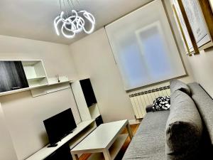 TV a/nebo společenská místnost v ubytování Casa Mica