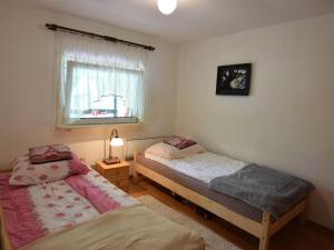 Llit o llits en una habitació de Holiday home in Zakowo