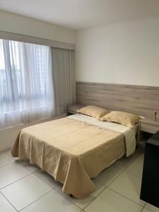 Postel nebo postele na pokoji v ubytování Golden Point Apartamento em Recife