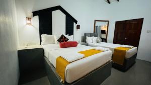 Postel nebo postele na pokoji v ubytování Sunshine Resort & Spa Sigiriya
