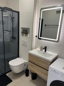 Bilik mandi di Seafront Studio-Apartment