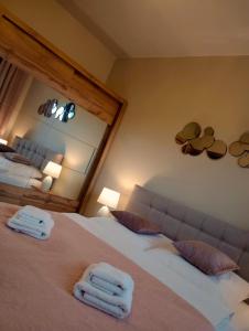 Ένα ή περισσότερα κρεβάτια σε δωμάτιο στο Apartament SAN Osiedle w Dolinie Sanu