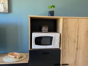 Cuisine ou kitchenette dans l'établissement Brise de mer sur la naturelle, Studio à Wimereux , parking