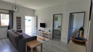 TV a/nebo společenská místnost v ubytování Casa da Caroleira