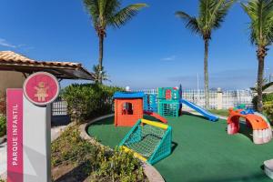 Ο χώρος παιχνιδιού για παιδιά στο Apart hotel a Beira Mar na praia do Recreio