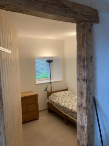 Postel nebo postele na pokoji v ubytování Le Fort
