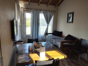 Posezení v ubytování Cabaña La Retama