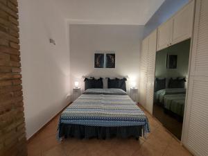 Postel nebo postele na pokoji v ubytování B&B Cala Seggiola
