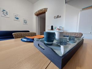 Posezení v ubytování B&B Cala Seggiola + 7 fotografií