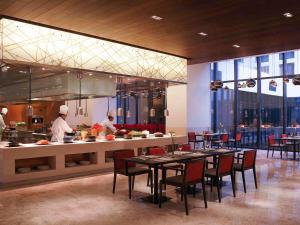 A restaurant or other place to eat at Novotel New Delhi Aerocity- International Airport
