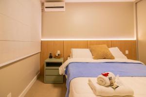 Llit o llits en una habitació de Rentaqui - Apartament Paulista Wall Street Diamond