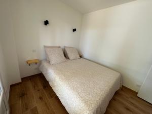 Postel nebo postele na pokoji v ubytování La Rougette