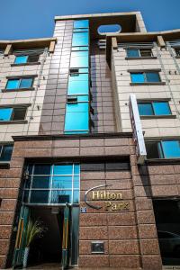 a building with the entrance to the entrance to a hotel at Hillstay Residence Hotel in Gumi