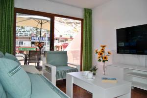 Posedenie v ubytovaní Bungalow montecarlo 35 and 45 first row with air conditioning&WI-FI and sound insulation