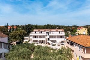an aerial view of a building in a city at Apartments with parking space Pakostane, Biograd - 22375 in Pakoštane