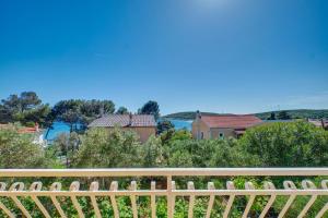 a view from the balcony of a house at Apartments by the sea Martinscica, Cres - 23222 in Martinšćica