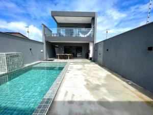 an image of a house with a swimming pool at Casa Sofia Milagres - 200 m da Praia in São Miguel dos Milagres +42 photos